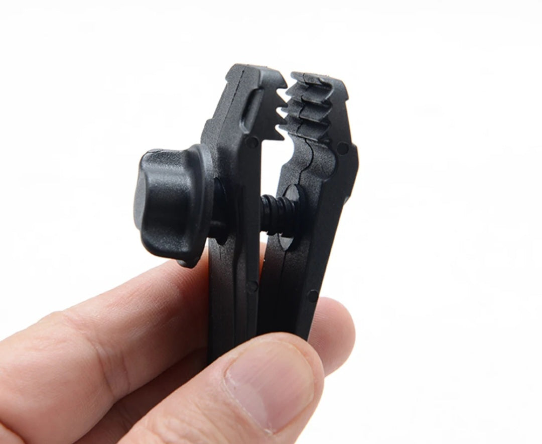 Tarp Clips.                Tame Flapping Tarps.